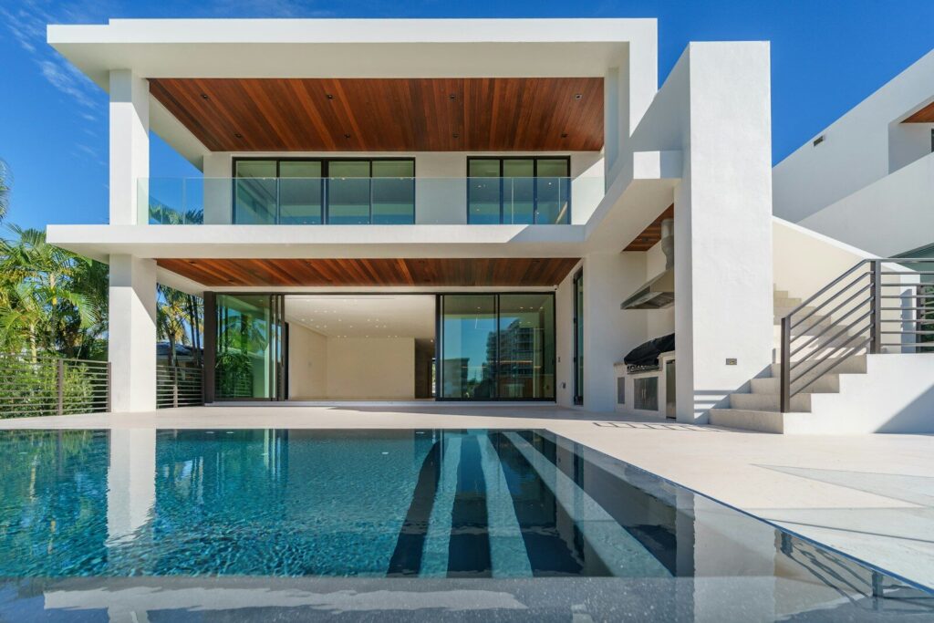 Photo by Avi Werde white and brown concrete building