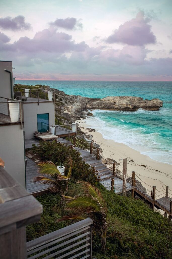 Photo by Roberto Nickson white and gray painted wooden house